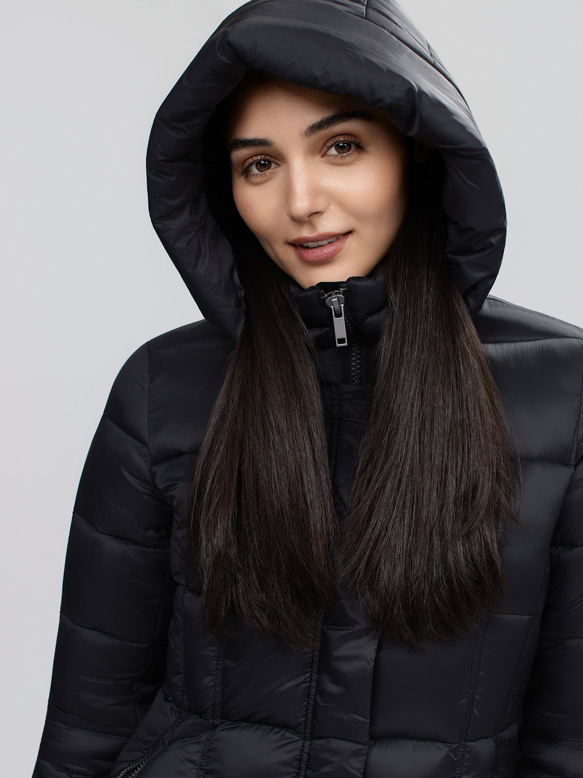 Manteau matelassé long ajusté